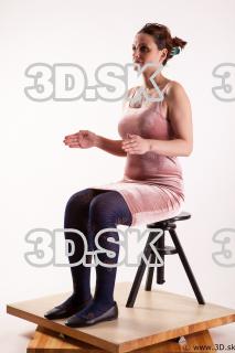 Sitting reference of whole body pink dress purple tights black…